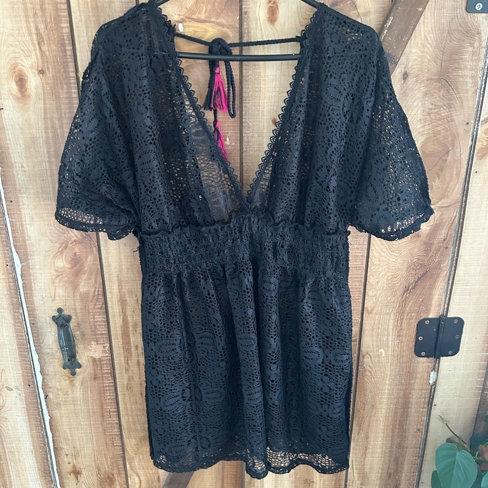 Xhilaration lace beach cover-up featuring a deep V-neck and pink tassel Vacation